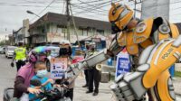 Robot Transformers Ajak Masyarakat Bermasker